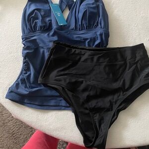 New Swimsuit with tag. Size M. 1/3 of the price